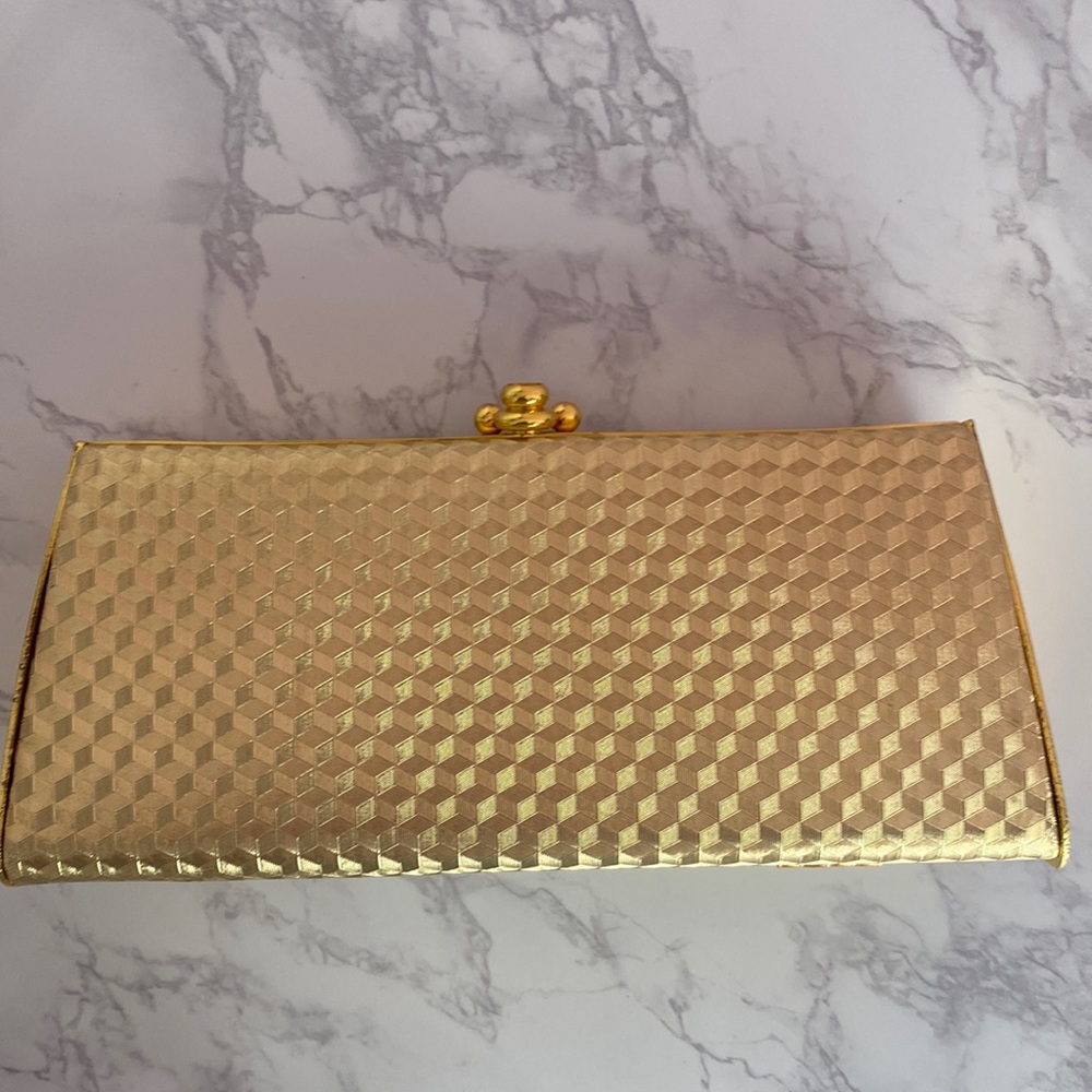 Gold textured clutch